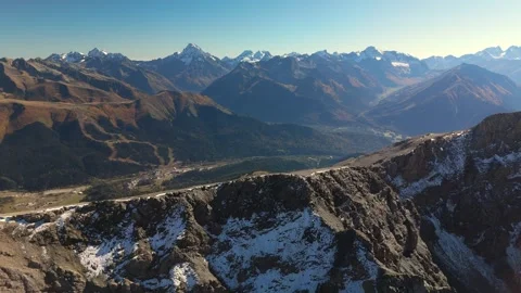 Panoramic drone orbit around alpine ridge and valleys Stock Footage 336022971