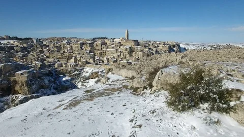 Panoramic drone of Sassi of Matera filled with snow Video stock 106068403