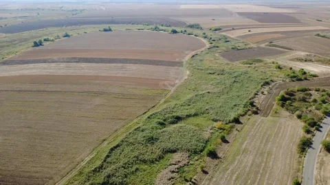 Panoramic Drone Shot Over Summer Farmland. Stunning Drone Aerial of Cultivated Stock Footage 340034530