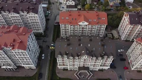 A panoramic drone view of a beautiful British-style residential Stock Footage 147846051