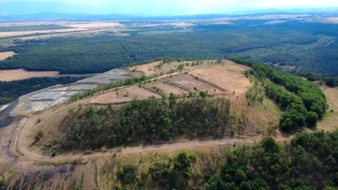 Panoramic drone view of the circular Tsar Asen mine pit in Bulgaria . Stock Footage 311750493