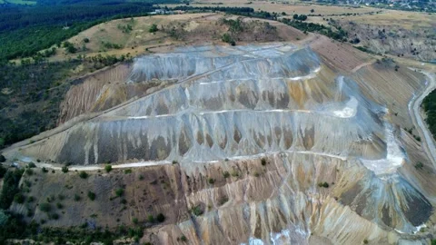 Panoramic drone view of the circular Tsar Asen mine pit in Bulgaria. Stock Footage 311750521