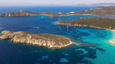 Panoramic drone view of the coastline of a perfectly clear sea on the Italy Stock Footage 249176718