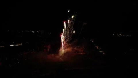 Panoramic drone view of fireworks at the end of Fête des bouviers in Loriol Stock Footage 248075296