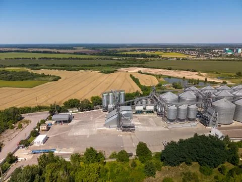 Panoramic Drone View of Industrial Processing Plant and Countryside Farmland Stock Photos