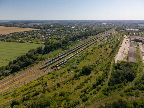 Panoramic Drone View of Large Railroad Yard with Freight Trains in Countrysid Fotos Stock