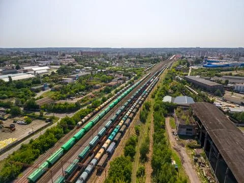 Panoramic drone view of multiple freight cargo trains on parallel railway t.. Fotos Stock