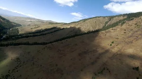 Panoramic drone view of nature landscape with mountains and forest Stock Photos