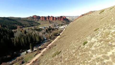 Panoramic drone view of nature landscape with mountains and forest Stockfoto's