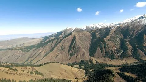 Panoramic drone view of nature landscape with mountains and forest Фото