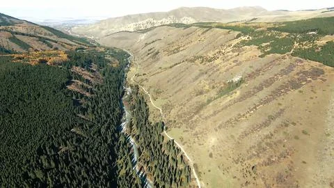 Panoramic drone view of nature landscape with mountains and forest Stockfoto's