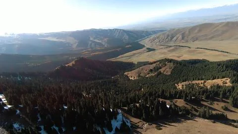 Panoramic drone view of nature landscape with mountains and forest Stockfoto's