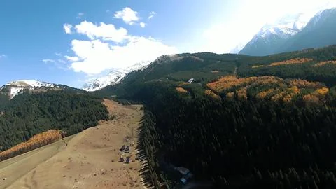 Panoramic drone view of nature landscape with mountains and forest Stockfoto's