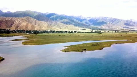 Panoramic drone view of nature landscape with mountains and forest Фото