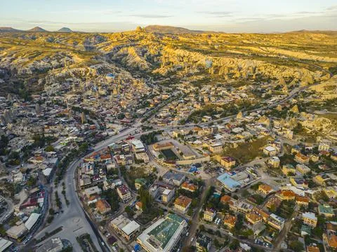 Panoramic drone view of Nevsehir town in the Capadoccia valleys, rock formations Stock Photos