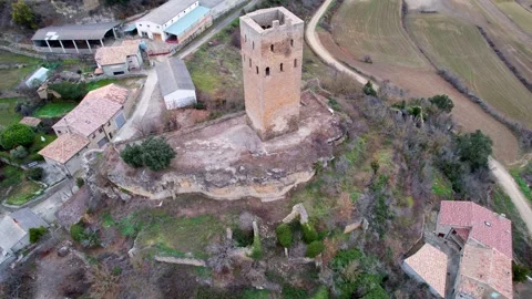 Panoramic drone view of old medieval 11th century defensive tower built Video stock 248730844
