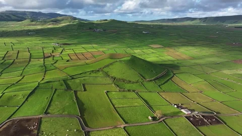 Panoramic drone view over lush patchwork Terceira landscape and Pico Dona Joana Stock Footage 328735269