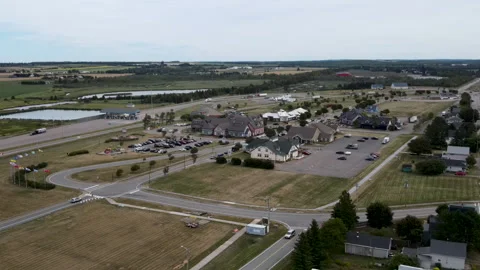 Panoramic drone view over the quiet coastal town of Borden-Carlton, Canada. Stock Footage 339604930