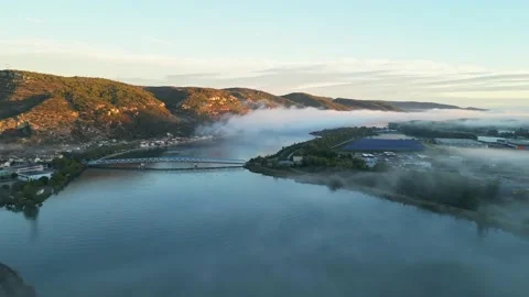 Panoramic drone view of the Rhone River in the morning with heavy fog. Stock Footage 219588762