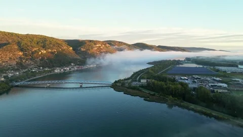 Panoramic drone view of the Rhone River in the morning with heavy fog. Stock Footage 219589383
