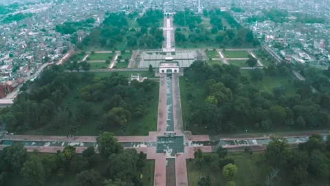 Panoramic drone view of Shalimar Gardens and surrounding Lahore cityscape Stock Footage 346322343