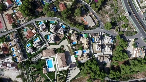 Panoramic drone view of Spanish coastal communities of La Nuccia and Benidorm Stock Footage 73698505
