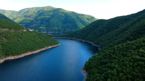 Panoramic drone view of the stunning Vacha Reservoir in Bulgaria Stock Footage 310936544