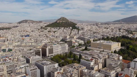 Panoramic drone view of Syntagma Square on a clear day with Hellenic Parliament Stock-Footage 327846826