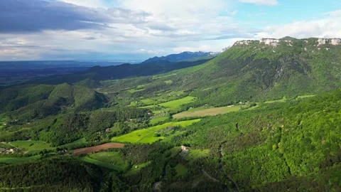 Panoramic drone view of tree-covered hillsides of the heights of the Vercors Video stock 242724893