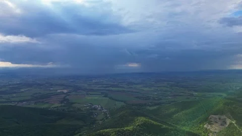 Panoramic drone view of tree-covered hillsides of the heights of the Vercors Stock Footage 242724961