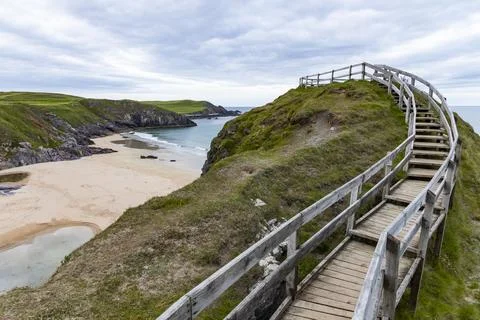 Panoramic Durness Beach, waves, sand and striking rocks along the shore. Stock Photos
