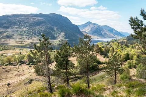 Panoramic elevated view of the mountains surrounding Loch Shiel in the Scottish Stock Photos