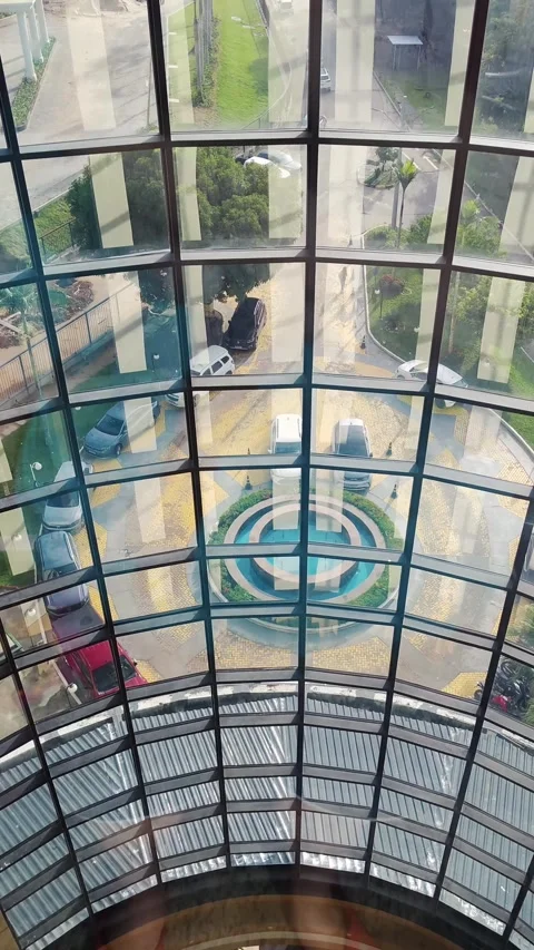 Panoramic elevator going down on office building. Cityscape open glass elevator Stock Footage 309121648
