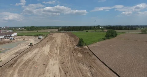 Panoramic Of Farmers Field To New Construction Aerial Vídeos de archivo 88920140