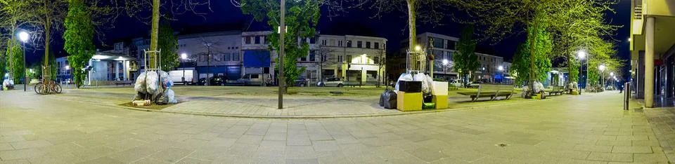 A Panoramic of Garbage Collection at Night. Stock Photos