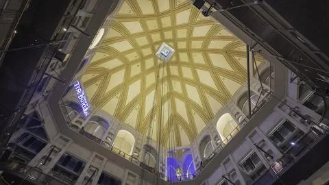 Panoramic glass elevator ascending inside Mole Antonelliana in Turin, Italy Stock Photos