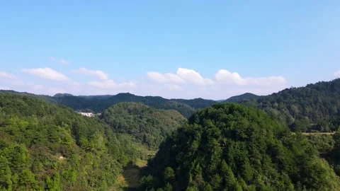 Panoramic green mountains in Wanfenglin scenic area during autumn Stock Footage 342304595