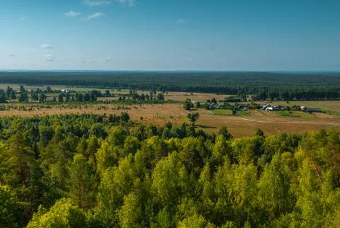 Panoramic high angle view of the plain, the village and the woods from hill t Stock Photos