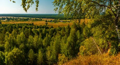 Panoramic high angle view of the plain, the village and the woods from hill t Stock Photos