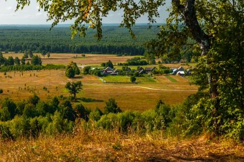 Panoramic high angle view of the plain, the village and the woods from hill t Stock Photos