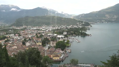 Panoramic high-angle view of Riva del Garda resort city, harbour, and surroundin Stock Footage 341331755