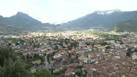Panoramic high-angle view of Riva del Garda resort city, harbour, and surroundin Stock Footage 341334270