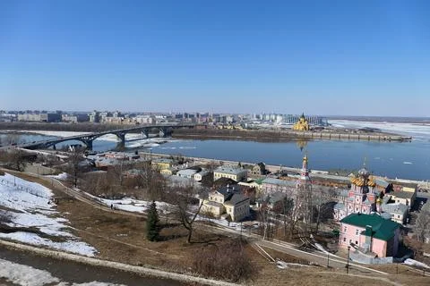 A panoramic image on a bridge over a river in a port city with modern buildings Stock Photos