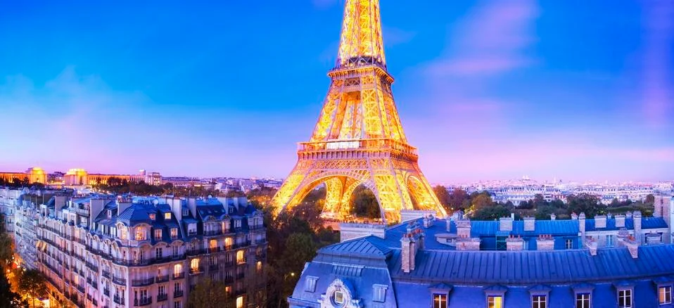 Panoramic image of the Eiffel Tower at dusk Stock Photos