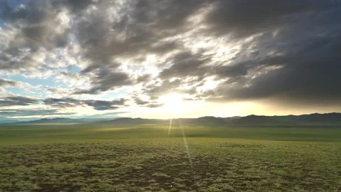 Panoramic Kazakhstan steppe landscape in spring, vast green plain under prairie Vídeos de archivo 333762444