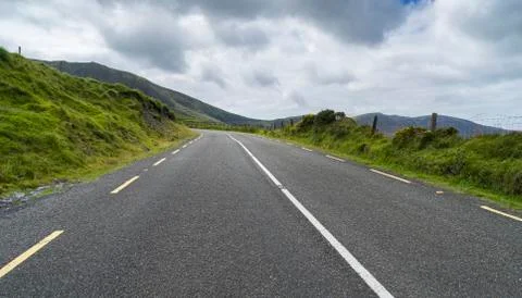 Panoramic landscape with a highway  Empty mountain. Stock Photos