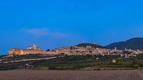 Panoramic landscape timelapse. Assisi Basilica of St. Francis day to night. Stock Footage 118844482