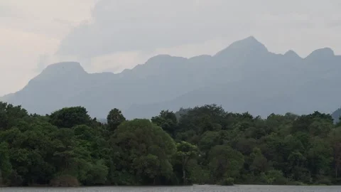 Panoramic landscape view of a mountain lake on a cloudy day Stock Footage 337765874
