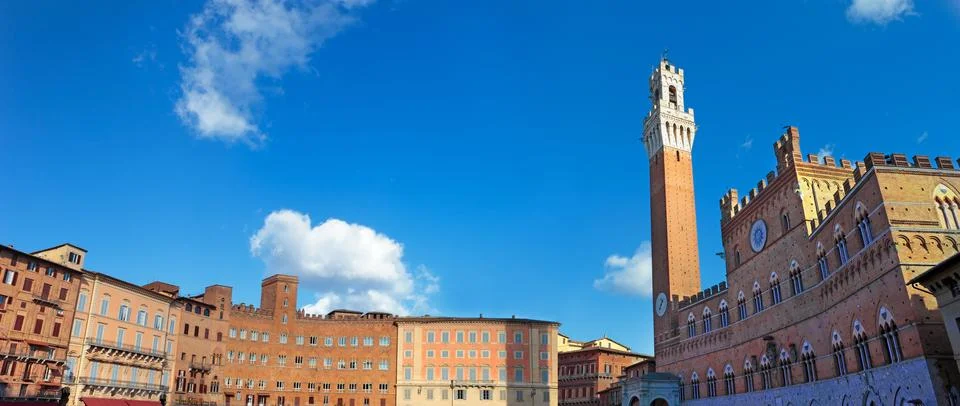 Panoramic large view of Piazza del Campo with Mangia bell tower, Siena, Tusca Stock Photos