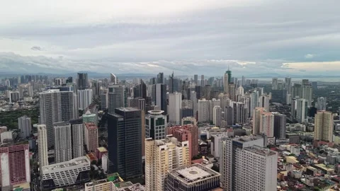 Panoramic Makati Skyline Under Broad Overcast Afternoon Stock Footage 330874975
